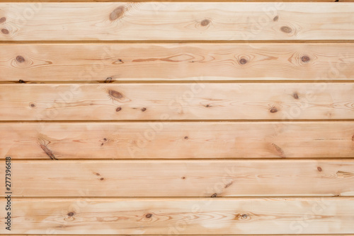 Wood Glued timber plank background. Wooden construction glued laminated timber in the wall of the house. Glued beams texture. Natural pattern pine wood background
