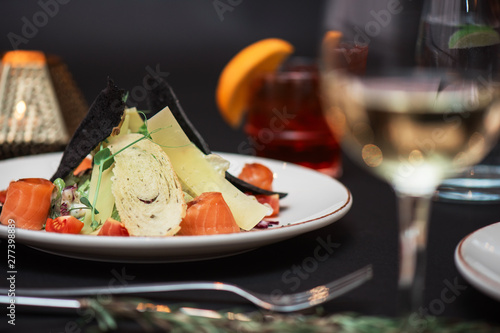 Caesar salad with salmon fi...
