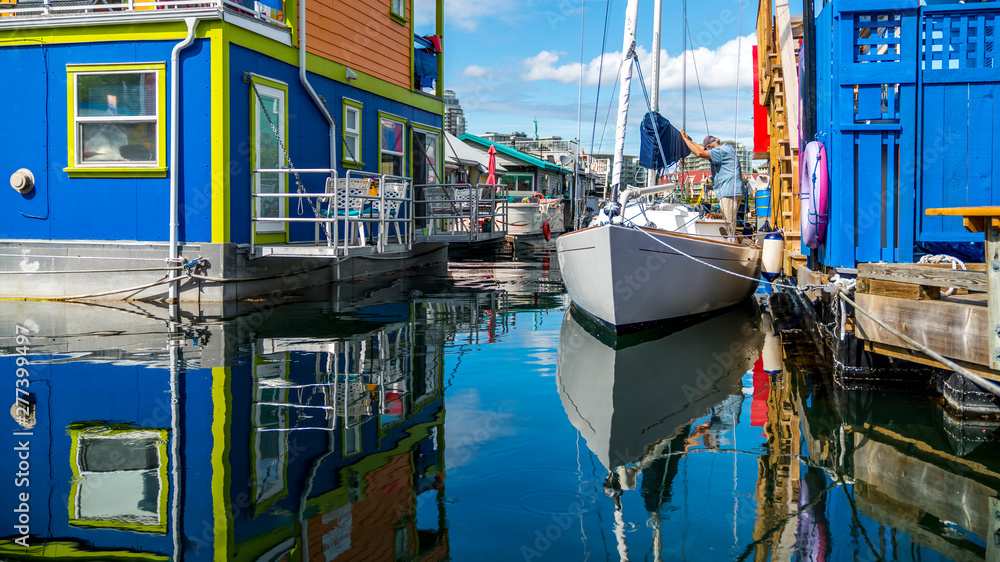 Victoria, Vancouver Island British Columbia Canada.  Boat Houses at Fisherman's Wharf.