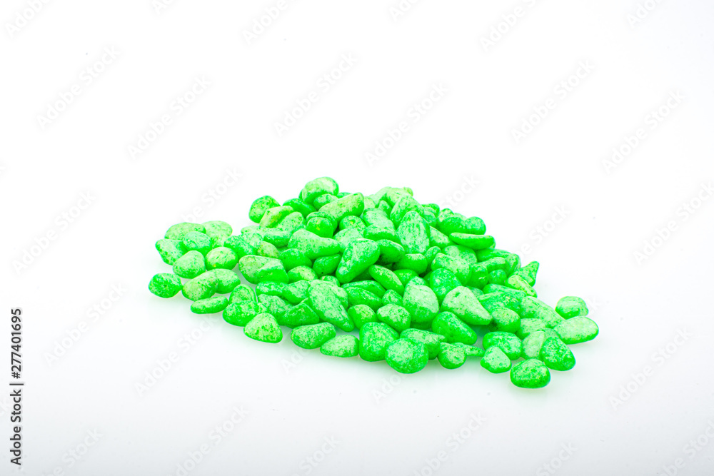 Green pebbles stone with empty copyspace area for slogan or advertising text message, over isolated white background. Green pebbles stone with empty copyspace area for slogan or advertising text message, over isolated white background.