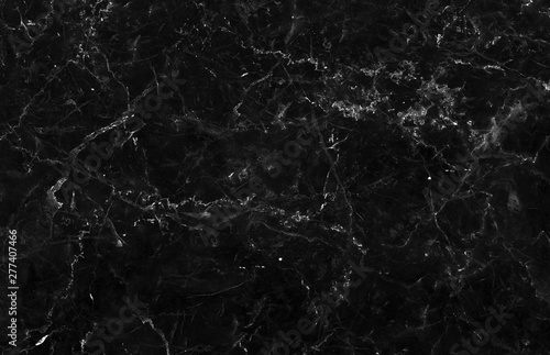Black marble background texture natural stone pattern abstract for design art work. Marble with high resolution f