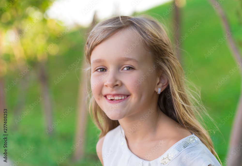 little girl face, green background, close up little girl face, green background, close up