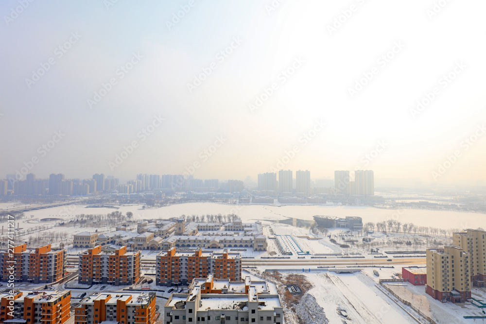 Obraz premium Urban buildings in the snow, China
