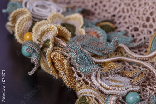 Crochet knitting. Lace of flowers. Handmade Irish lace as a background