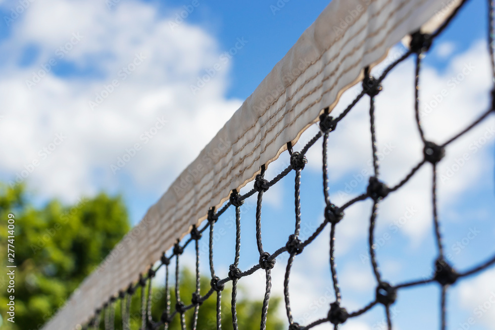 Fototapeta premium Tennis Net, under a Blue Sky