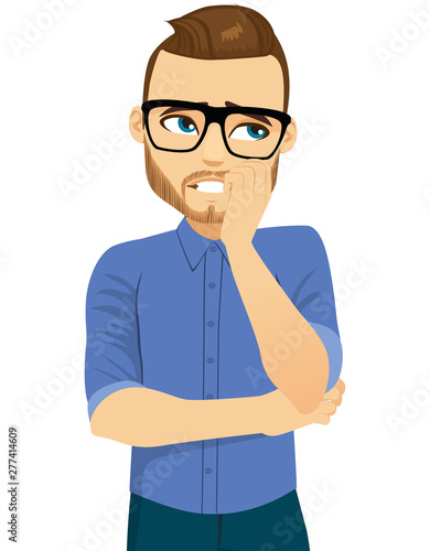 Young man with concerned face expression biting nails