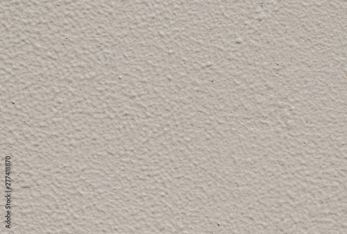 Grey concrete wall with rough surface as background