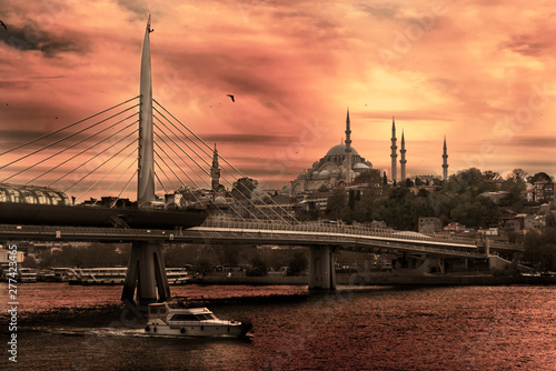 Unkapani Metro bridge and Suleymaniye Mosque in Istanbul Eminonu Turkey.
