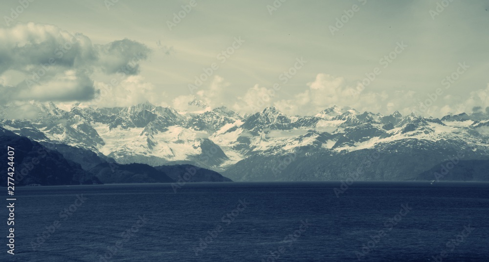 View of Glacier in mountain valley in Glacier Bay National Park and Preserve