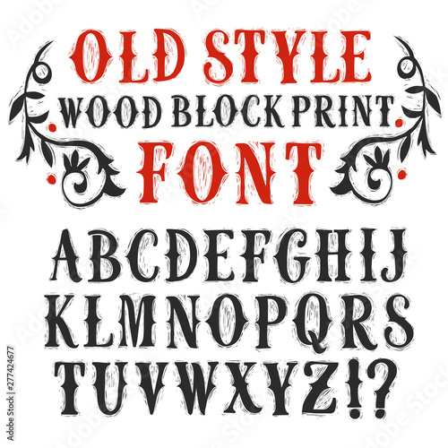 Decorative vintage wood block print style textured vector font.