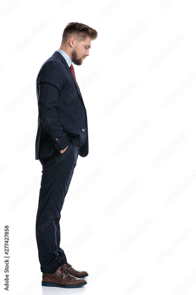 Side view of a confident businessman standing Side view of a confident businessman standing