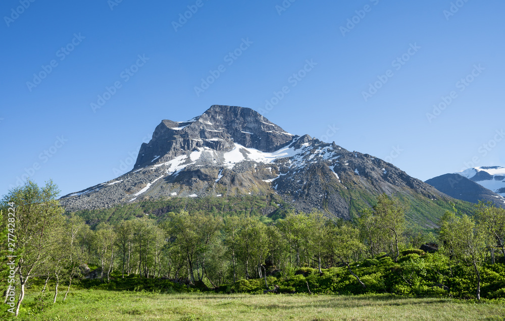 Satbakkollen - a 1,632-metre (5,354 ft) tall mountain in Sunndal Municipality in More og Romsdal county. Trollheimen mountain range, north of the Sunndalen valley. Norway.