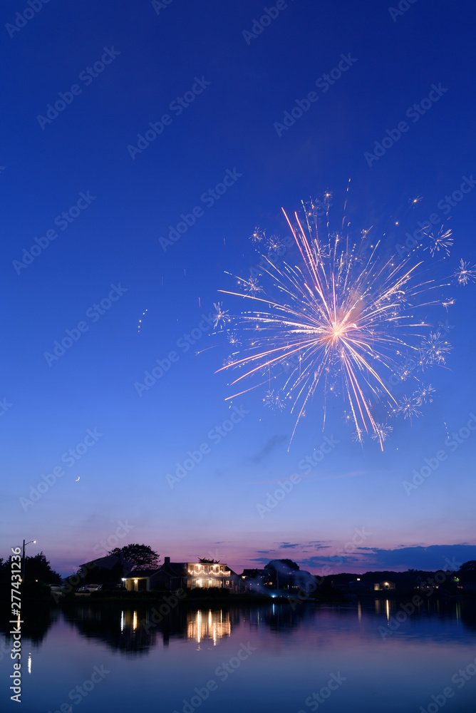 Fototapeta premium Fireworks over house