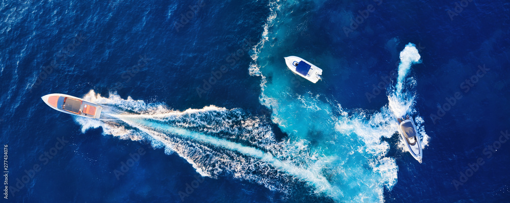 Croatia. Yachts at the sea surface. Aerial view of luxury floating boat on blue Adriatic sea at sunny day. Travel - image - obrazy, fototapety, plakaty 