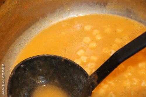  egg pasta soup with olive oil in a dish photo