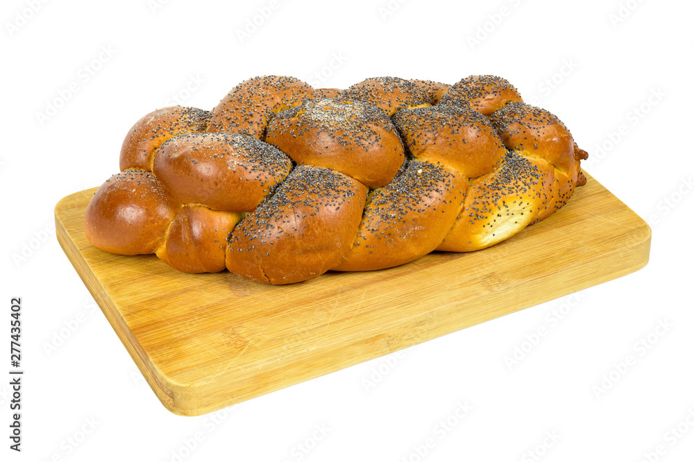 Challah bread on chopping board Challah bread on chopping board