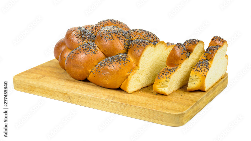 Sliced challah bread on chopping board Sliced challah bread on chopping board