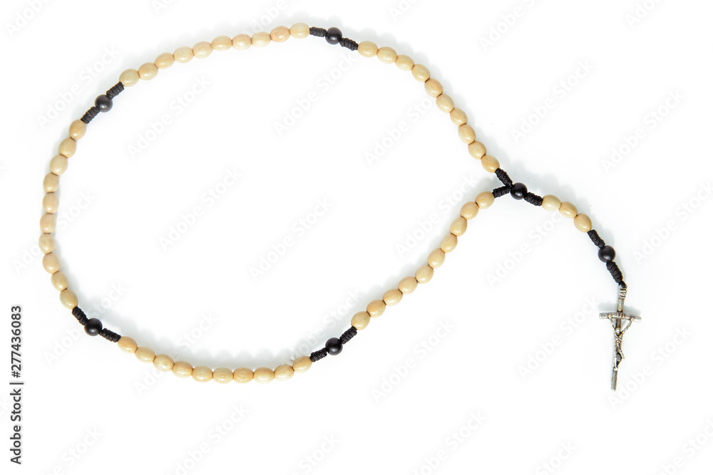 Rosary on a white, isolated background. The concept of Christian faith, Catholicism. Pray for grace, faith in God. Problems of the Catholic church, priests' blemishes. Rosary on a white, isolated background. The concept of Christian faith, Catholicism. Pray for grace, faith in God. Problems of the Catholic church, priests' blemishes.