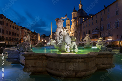 Fountain of Neptune (Fontana del Nettuno) at Piazza Navona, Rome, Italy in twilight photo