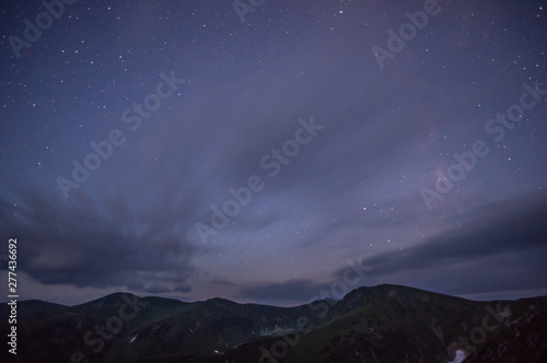 Starry sky at night over the mountains in the Carpathians © onyx124