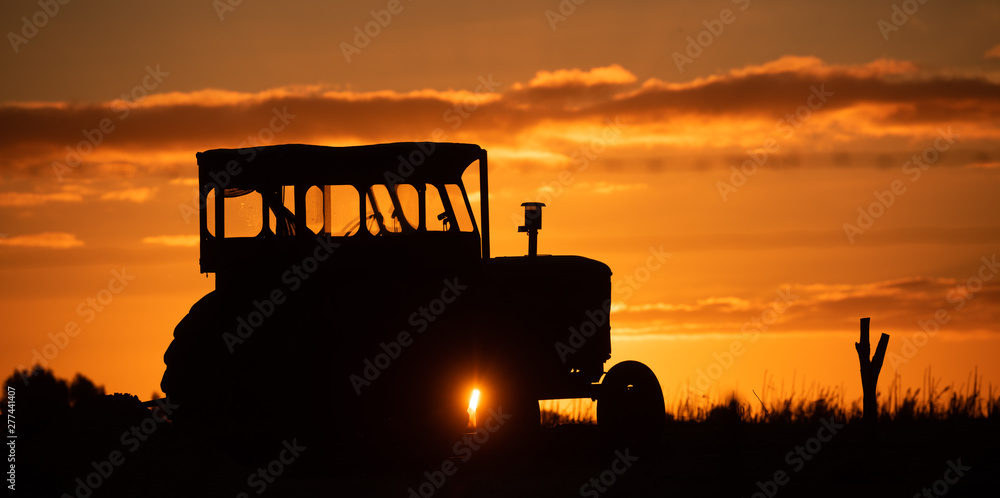 Silhouette of a tractor Silhouette of a tractor
