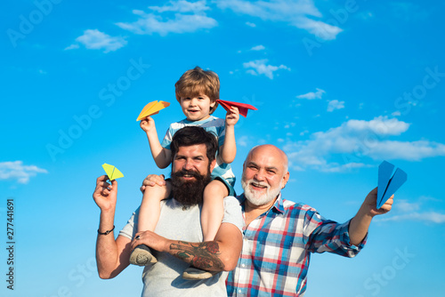Men generation. Generation of people and stages of growing up. Father and son enjoying outdoor. Father and son with grandfather - happy loving family.