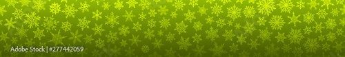 Christmas banner of many complex small snowflakes in green colors. With horizontal repetition