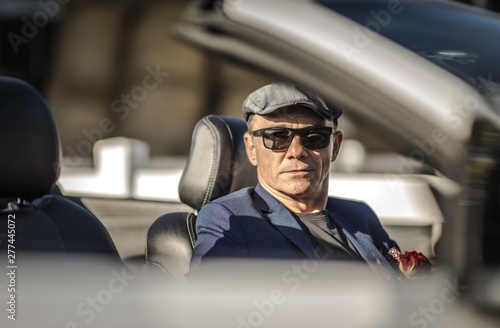 Retired Men in a Cabriolet photo