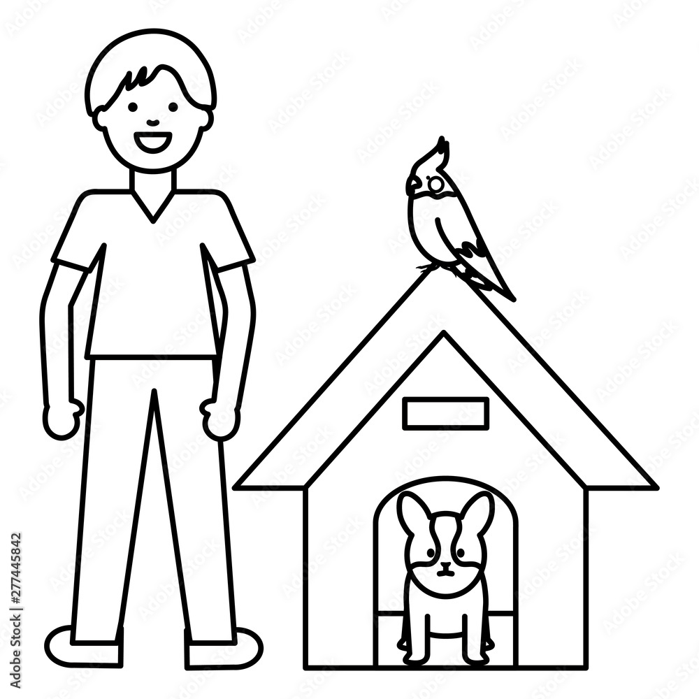 young man with dog and bird in wooden house young man with dog and bird in wooden house