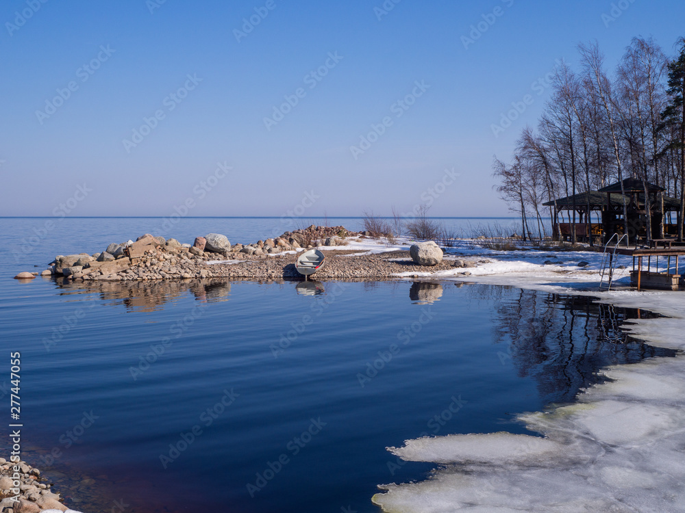 Little stony bay of Ladoga lake in early spring