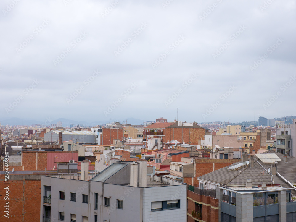 Beautiful top view on Barcelona on a cloudy day, Spain Beautiful top view on Barcelona on a cloudy day, Spain