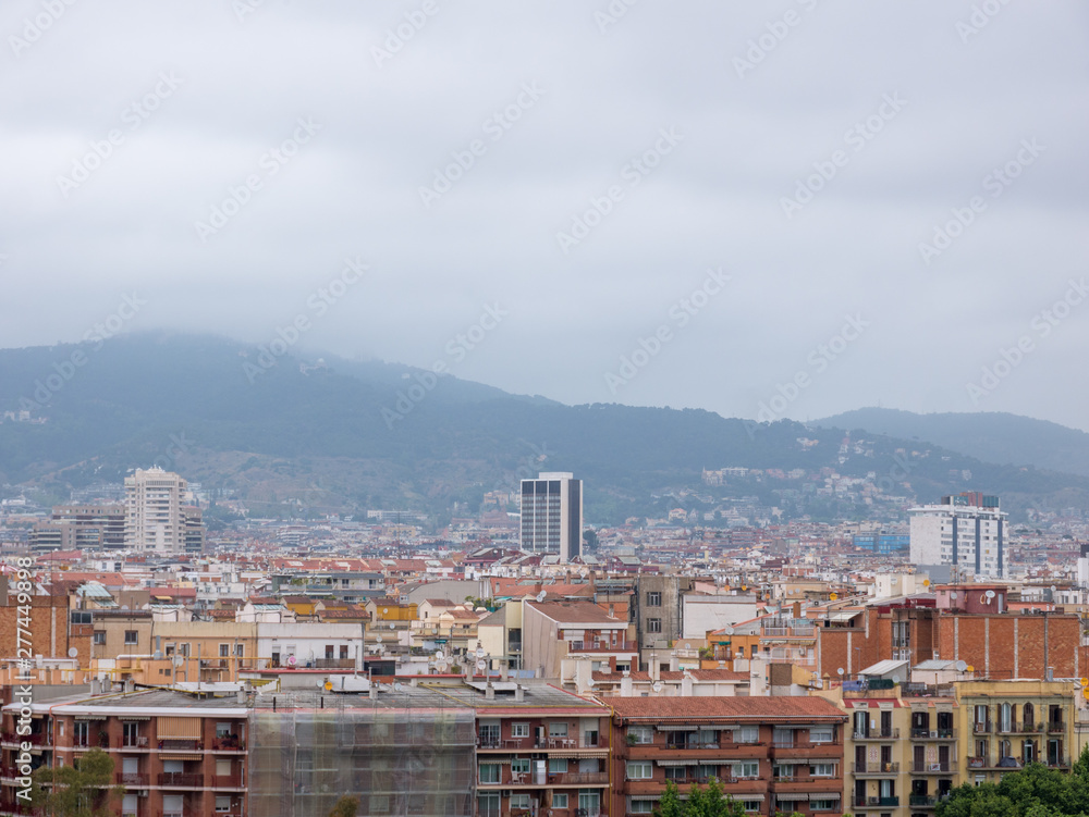 Beautiful top view on Barcelona on a cloudy day, Spain
