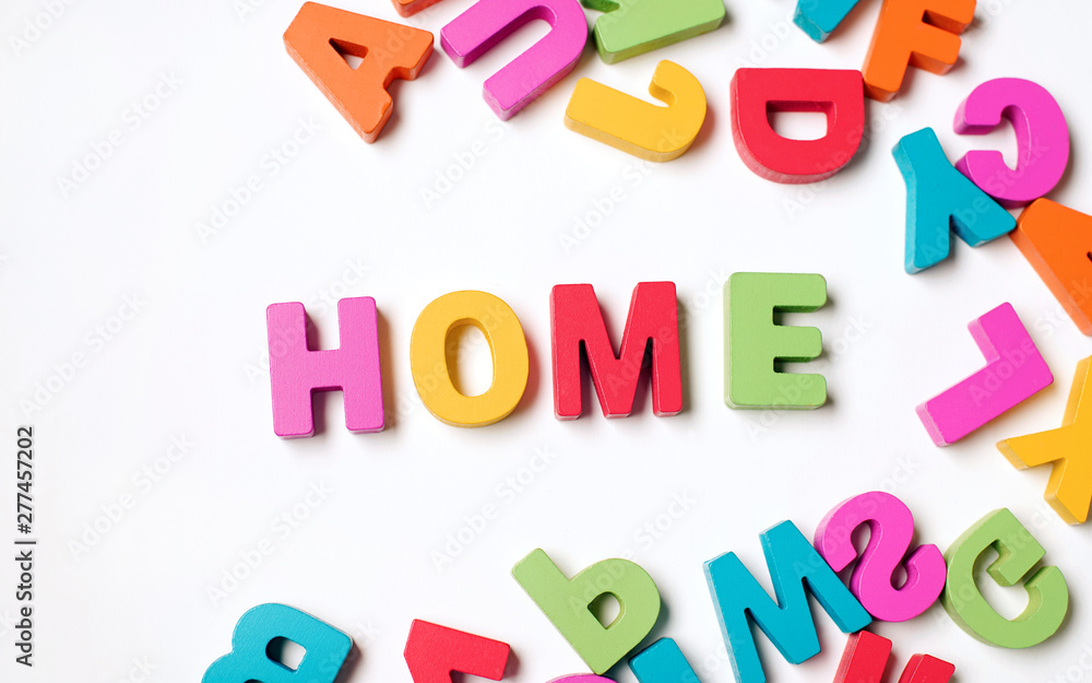 Obraz premium Isolated ' HOME ' Colorful Wooden Letters and Word, Learning English Word and Meaning