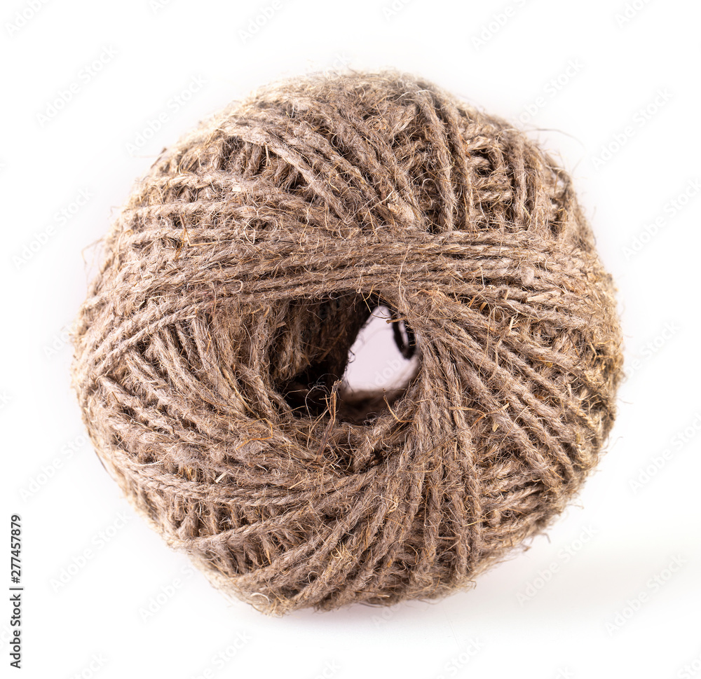 The skein of jute twine isolated on the white background The skein of jute twine isolated on the white background