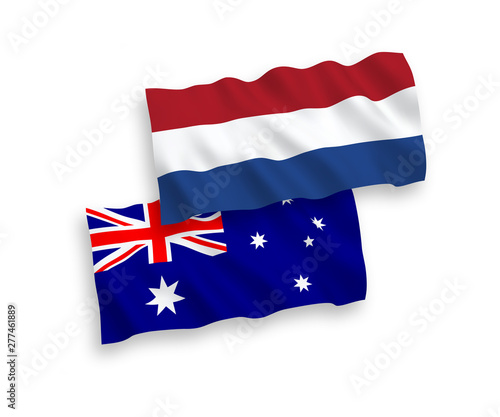 National vector fabric wave flags of Australia and Netherlands isolated on white background. 1 to 2 proportion.
