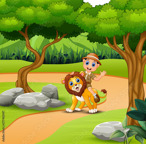 Zookeeper man with a lion walking around the jungle