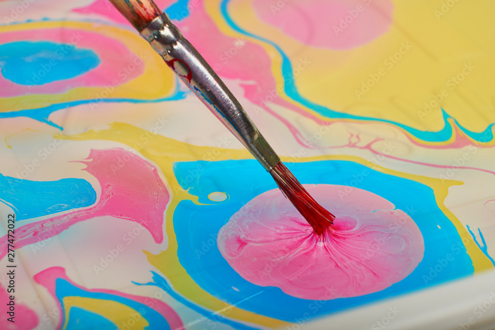 Ebru The art of painting on the water. Process of creating drawings