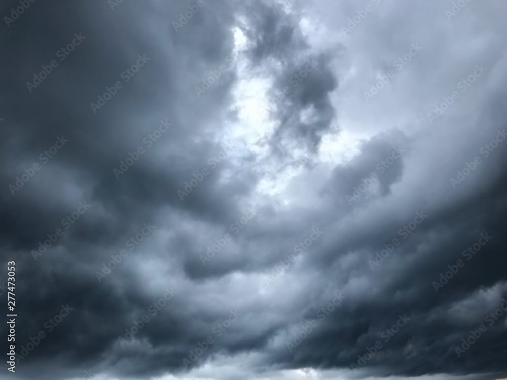 Fototapeta premium background of dramatic heavy dark clouds on the sky