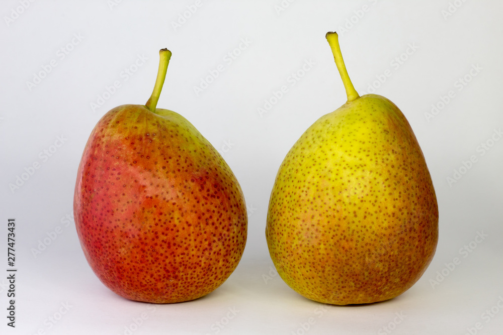 green-red pear on white background, close-up, copy space green-red pear on white background, close-up, copy space