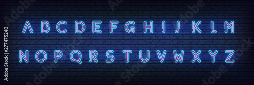 Neon alphabet font. Glowing neon colored 3d modern alphabet typeface.