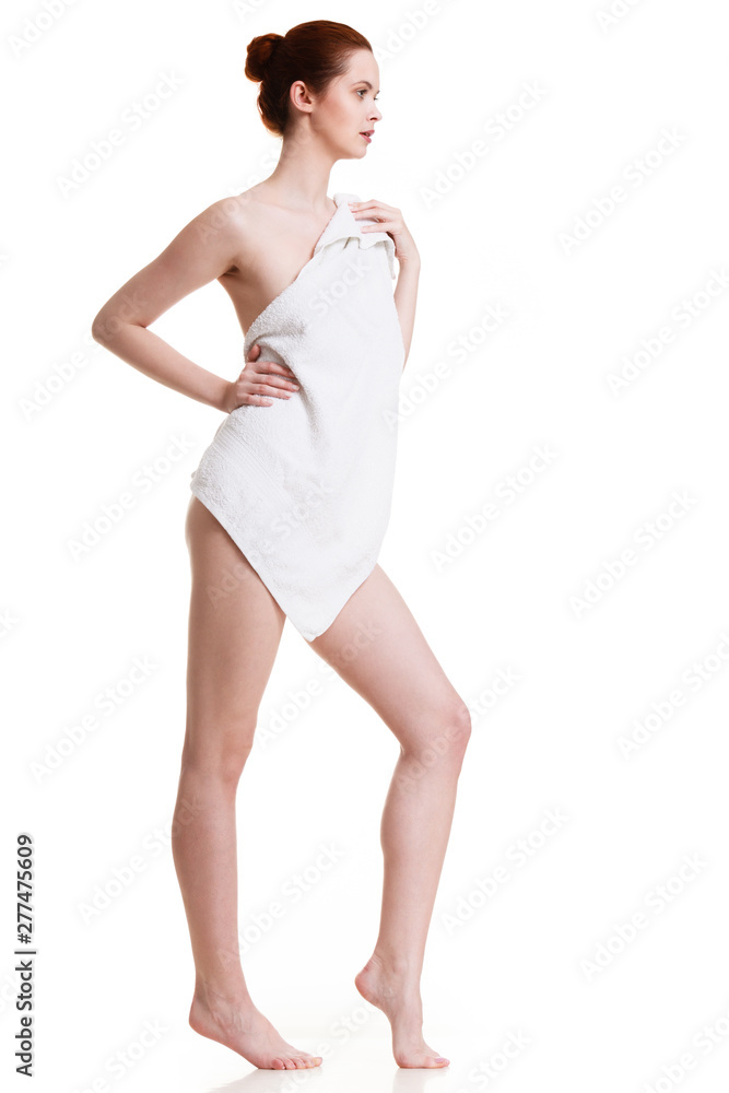 Naklejka premium Naked woman in towel after bath