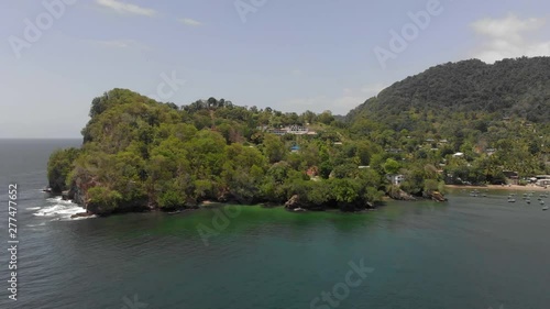 Coastline views of a fishing village on the Caribbean island of Trinidad and Tobago photo