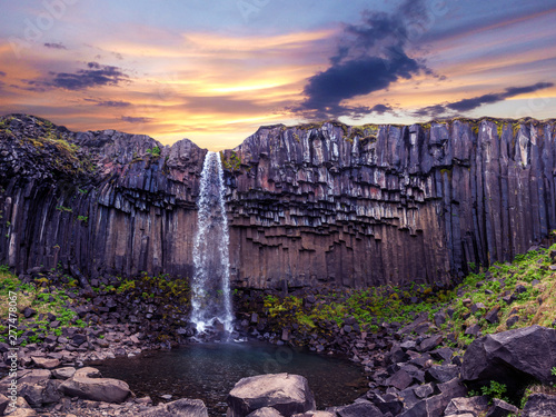 Canvas Print Magical landscape with a famous Svartifoss waterfall in the middle of basalt pillars in Skaftafell, Vatnajokull National Park, Iceland