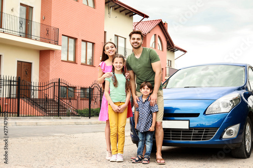 Happy family near car outdoors