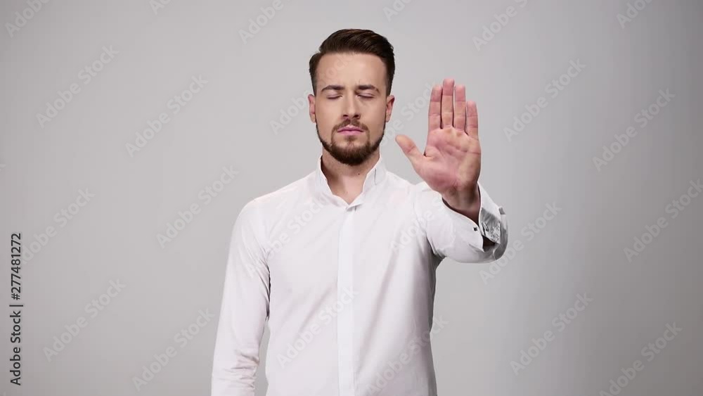 Stop gesture. Young man showing hand. Stop gesture. Young man showing hand.
