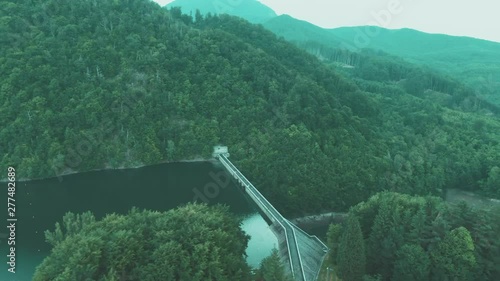 Aerial side motion 4k drone shot of Firiza dam in Romania photo