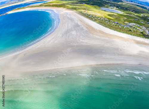 Aerial view of the awarded Narin Beach by Portnoo and Inishkeel Island in County Donegal, Ireland