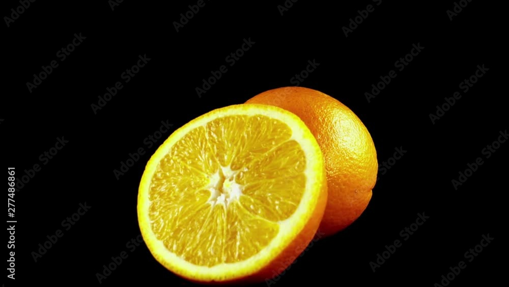 Oranges on a black background. Shooting on a black background. Oranges on a black background. Shooting on a black background.