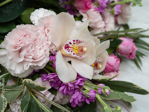 Fototapeta Naklejka Na Ścianę i Meble -  Wedding bouquet of orchids,matiolli, carnations, beautiful delicate flowers.