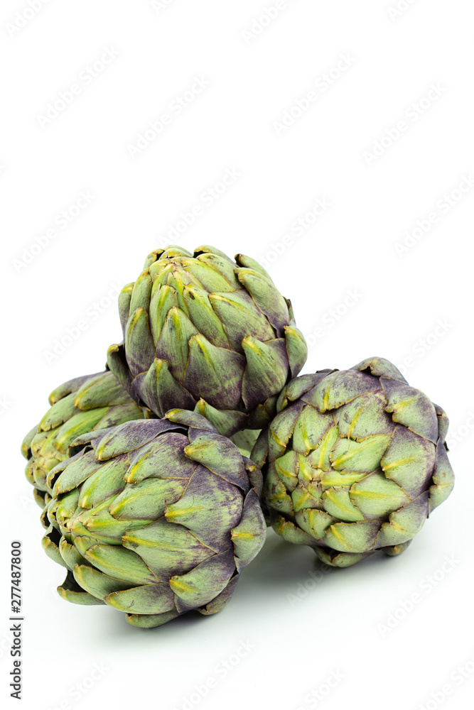 globe artichokes isolated on white copy space
